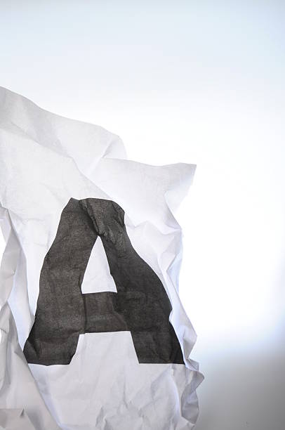 istock Black A letter printed on crumpled paper 178769530