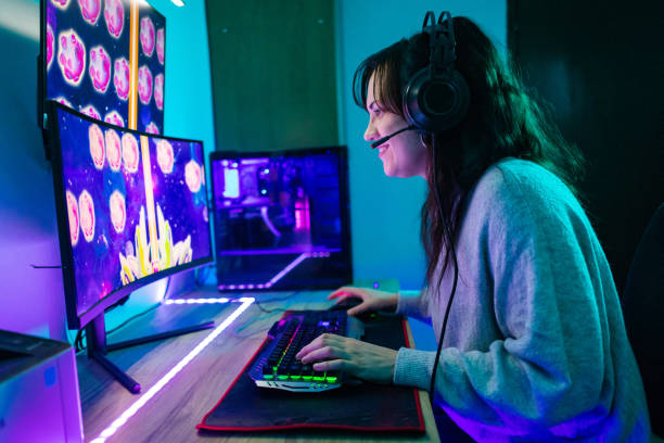 istock Happy woman playing video games on computer 1787695526
