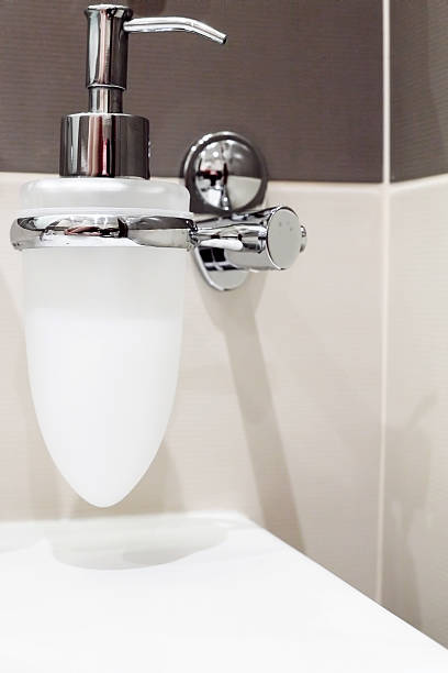 istock Faucet with soap dispenser in bathroom. 178769560