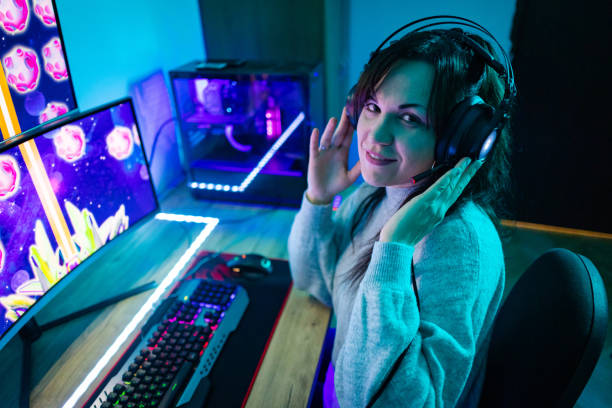 istock Woman gamer playing online video game 1787697104