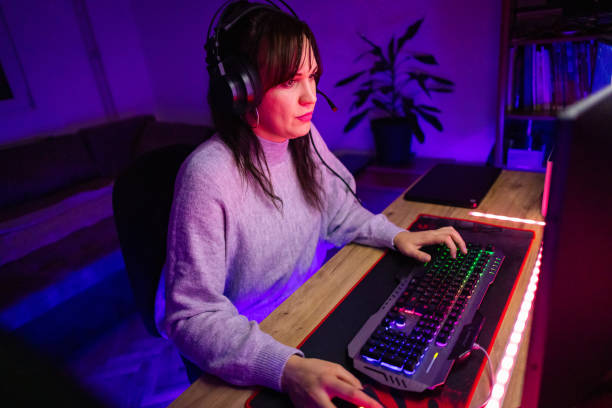istock Young woman playing video game 1787697279