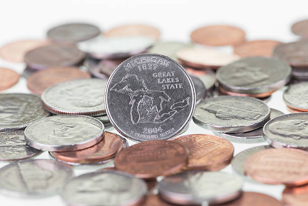 istock Michigan State Quarter with coins extreme close up 178770066