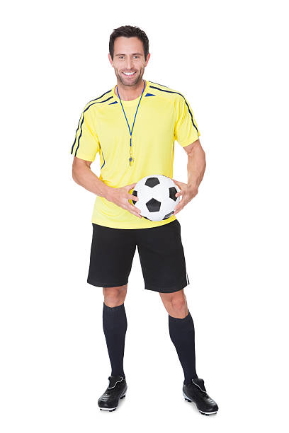istock Soccer judge standing with ball 178771661