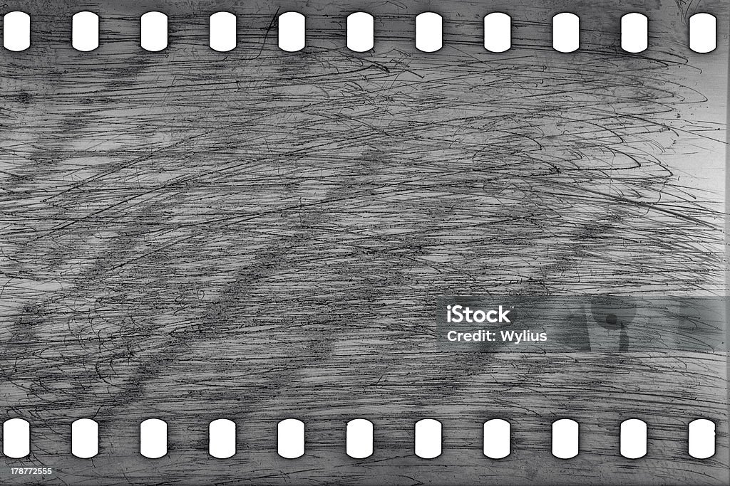 Old grunge filmstrip Blank grained scratched film strip texture background Black And White Stock Photo