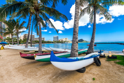 Famous Waikiki Beach with turquoise ocean and Diamond Head Crater in the background, Honolulu, Hawaii