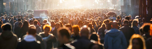istock Blurred crowd of unrecognizable at the street 1787736656