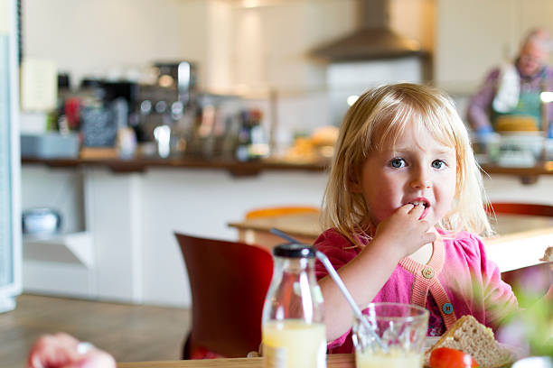 istock Young girl in a restaurant 178773976
