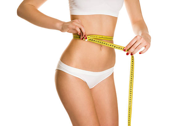 istock Slim woman measuring waist 178774705