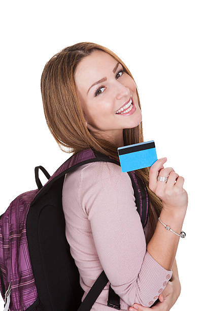 Female Student Holding Credit Card Over White Background