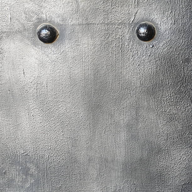 istock Black metal plate or armour texture with rivets 178774817