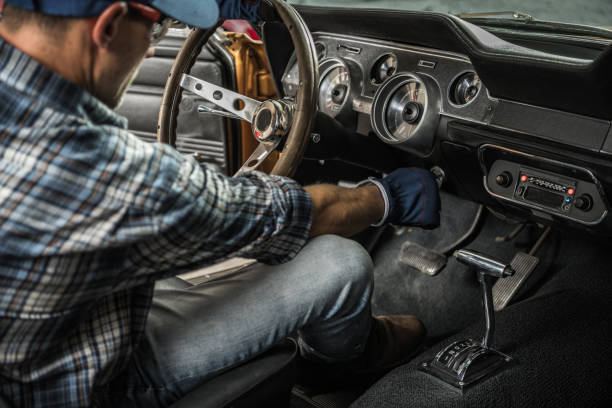 istock Classic Car Mechanic Inside American Muscle Car 1787751070