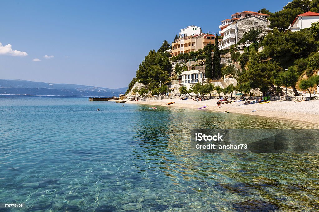 Beautiful Adriatic Beach and Lagoon with Turquoise Water Beautiful Adriatic Beach and Lagoon with Turquoise Water near Split, Croatia Adriatic Sea Stock Photo