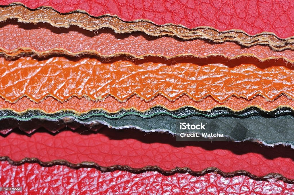 Faux Leather Swatches A stack of multicolored artificial leather swatches close-up Artificial Stock Photo