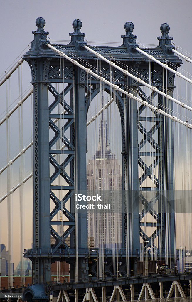 Empire State Building & Manhattan Bridge The empire state building framed by the Manhattan Bridge Empire State Building Stock Photo