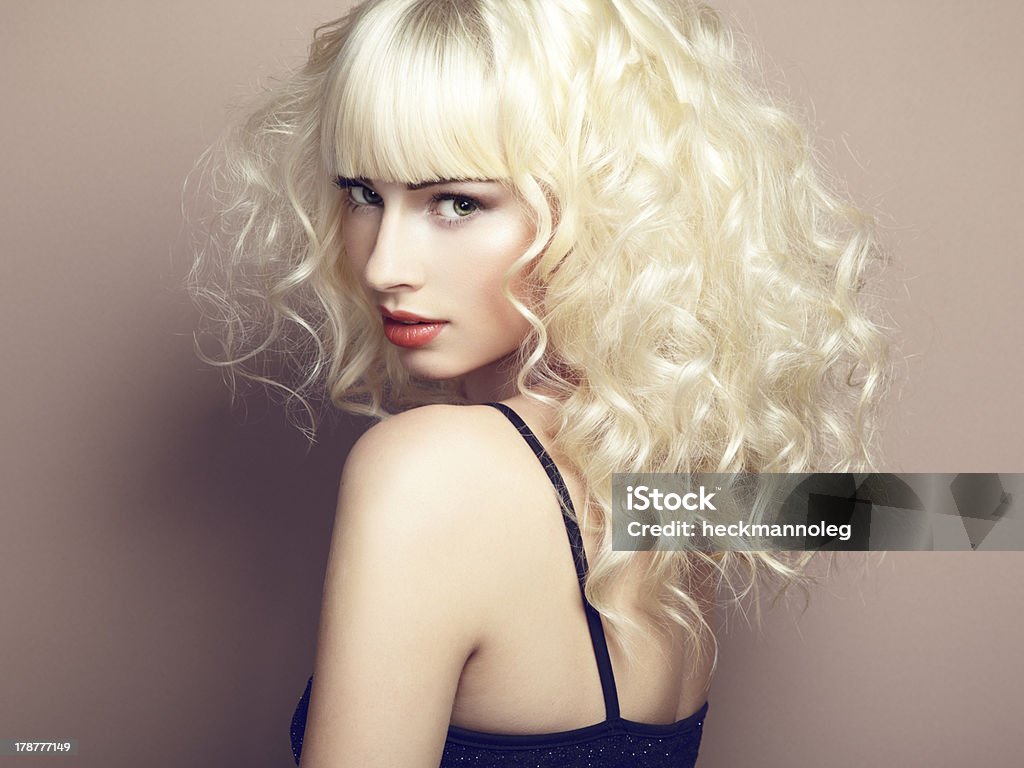Portrait of beautiful young blonde girl Portrait of beautiful young blonde girl. Fashion photo Adult Stock Photo