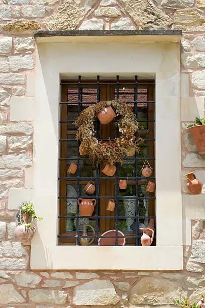 Window decorated with ceramic. Greece. Crete.