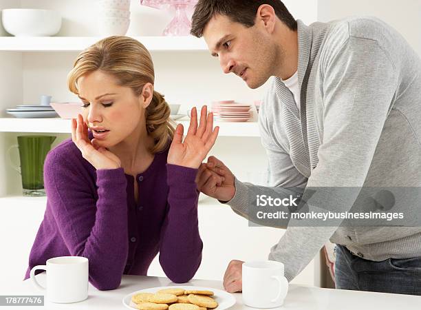 Couple Having Argument At Home Stock Photo - Download Image Now - 30-39 Years, Adult, Adults Only