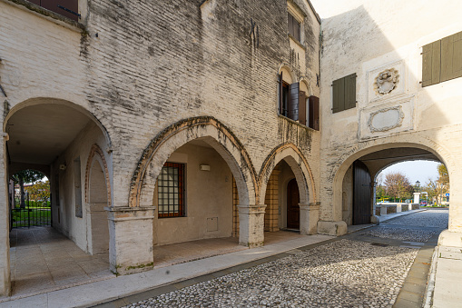 Portobuffolè, Italy. November 9, 2023. The medieval gate called Friuli surmounted by Toresin, 10th - 11th century
