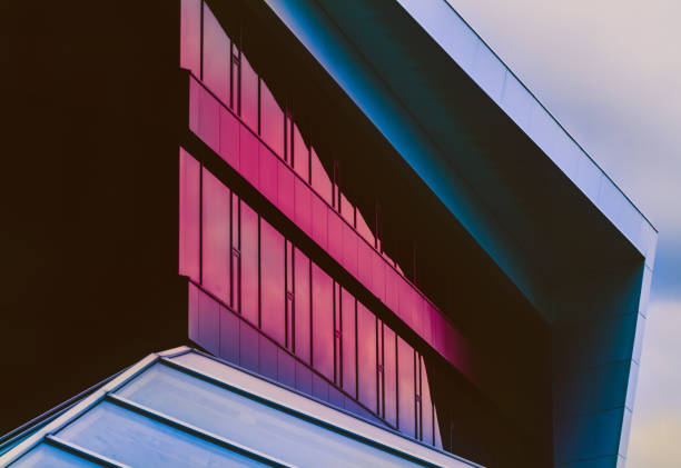 istock Modern generic downtown architecture. Commercial building exterior painted with colorful gradients 1787777808