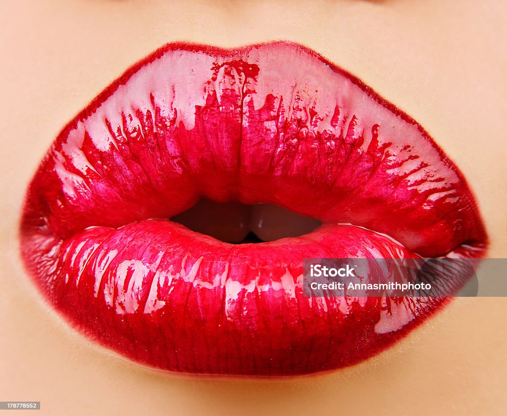 Beautiful red lips Beautiful sexy red lips giving kiss Adult Stock Photo