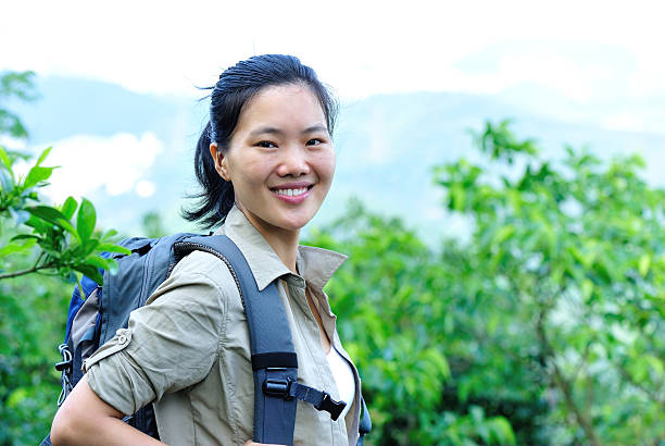 istock woman hiker stand mountain peak 178778602