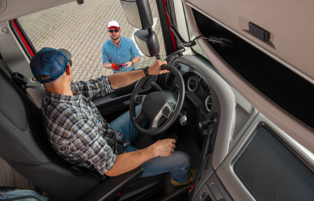 Freight Dispatcher Giving Last Instruction To Semi Truck Driver stock photo