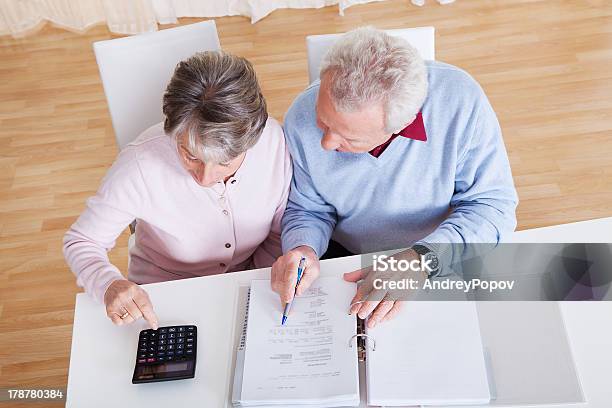 Senior Couple Calculating Budget Stock Photo - Download Image Now - Senior Adult, Retirement, Tax Form