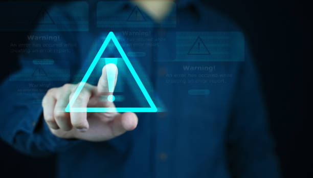 istock Emergency warning alert alarm concept, Data network protection, Virus alarm with people touch icon alert on screen. 1787823694