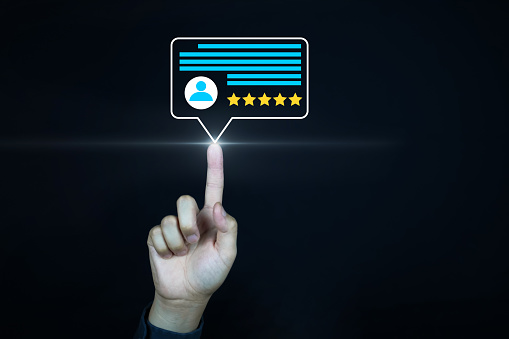 ๊User touch on five star icon for review and feedback rating, Customer Experience Concept,  Excellent Smiley Face and Rating for a satisfaction survey,  Positive customer feedback testimonial.