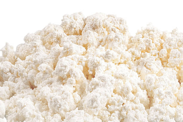 istock Fresh cottage cheese (curd) heap, isolated on white background . 178782881