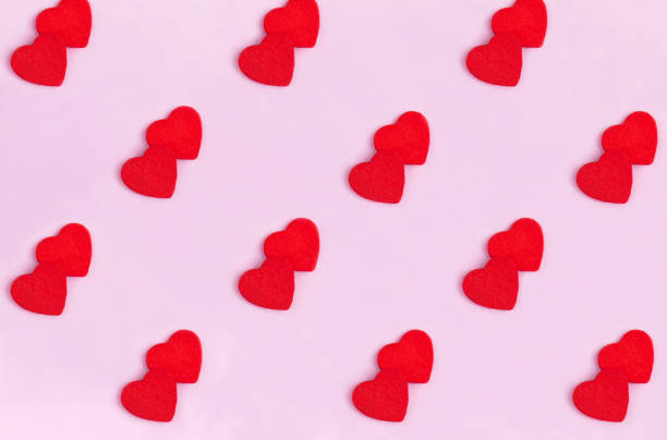 istock Background for Valentine's day. Red hearts on the pink background. Flay lay. Pattern. 1787830481