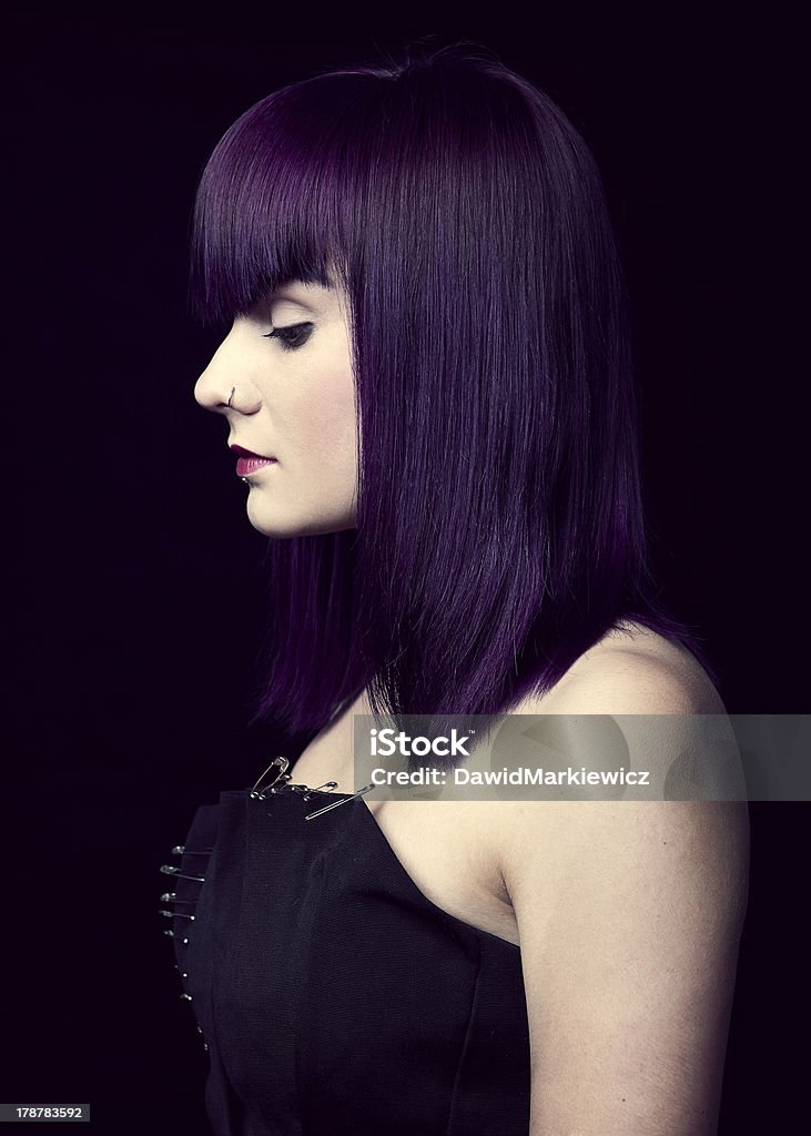 Purple lady Beautiful girl posing on black background 20-24 Years Stock Photo