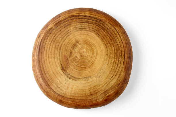 istock Brown wooden round board podium isolated on white background. Top view with copy space 1787844870