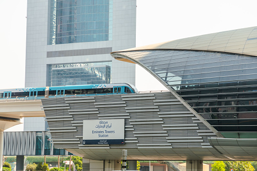 Dubai, United Arab Emirates - October 11, 2023: Dubai Metro entrance and highway