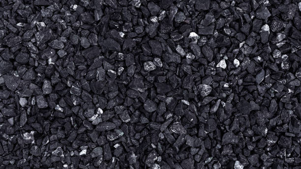 istock Small dark stone texture for background, pattern of gravel stone wall texture or stone background 1787848637