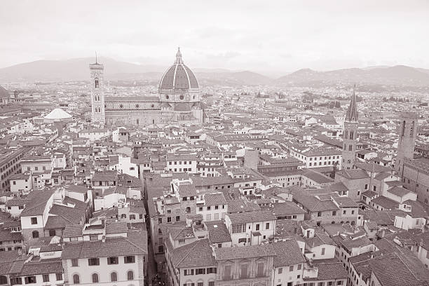 The Ponte alla Carraia Bridge is a five-arched bridge spanning the River Arno and linking the district of Oltrarno to the rest of the city of Florence, Italy. Old style. Sepia