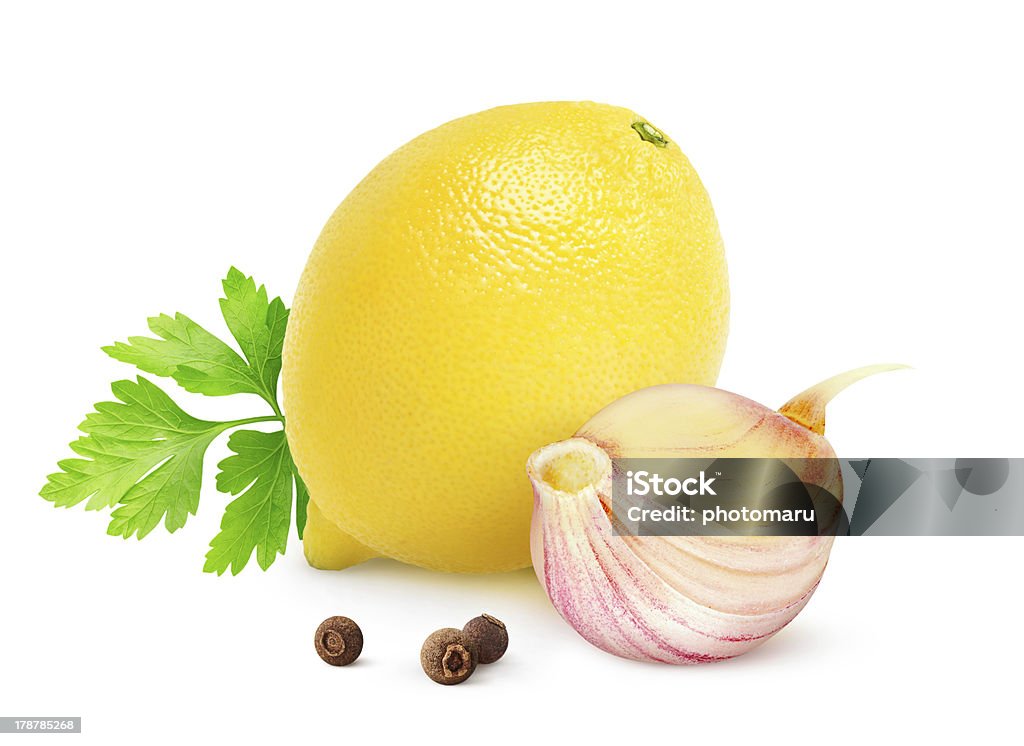 Spices Lemon, garlic and parsley (gremolata ingredients) isolated on white. Lemon - Fruit Stock Photo