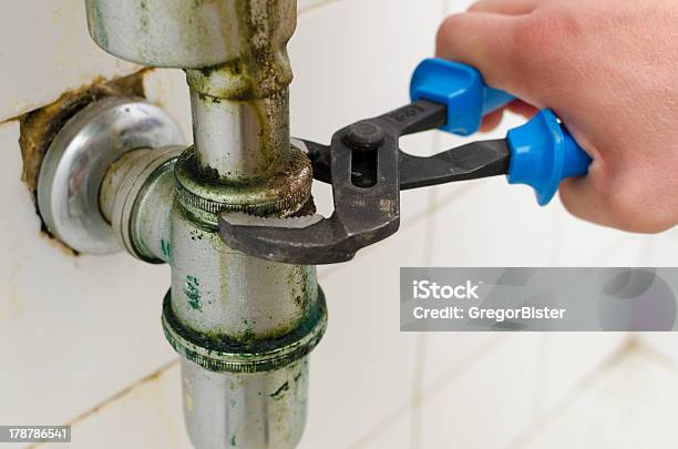 Plumbers Pipe Wrench Stock Photo - Download Image Now - Sink, Bathroom Sink, Leaking