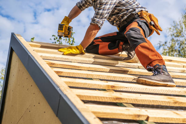 istock Roofing Contractor Attaching Wooden Elements to the House Roof 1787866602