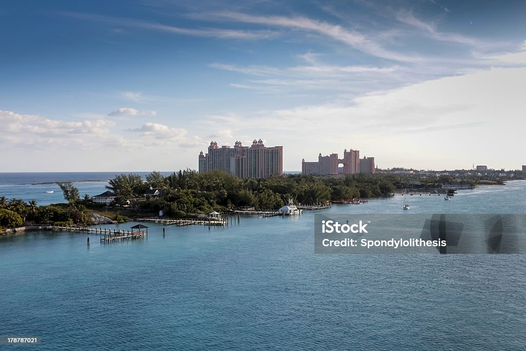 Bahamas- Paradise Island Atlantis hotel with pastel coloured holiday villas, Paradise Island, Nassau Bahamas Stock Photo