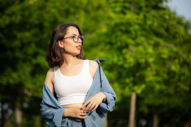 Portrait of beautiful young woman in nature.