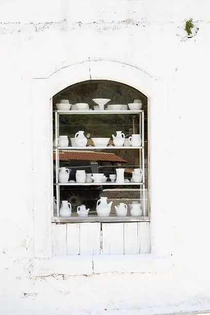Window decorated with ceramic. Greece. Crete.