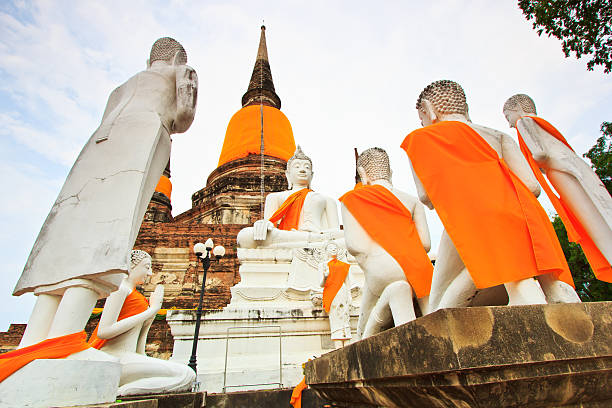 istock Ancient pagoda and white buddha statue 178787668