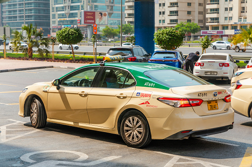 Dubai, United Arab Emirates - June 21, 2023: Dubai Transport Authority (RTA) taxi car