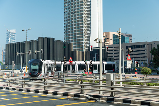 Dubai, United Arab Emirates - October 11, 2023: Moving tram in Dubai Marina