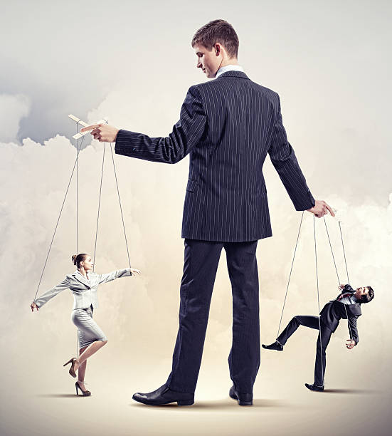 istock Businessman puppeteer 178788505