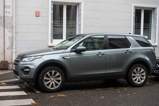 Mulhouse - France - 11 November 2023 - Profile view of grey range rover suv car parked in the street