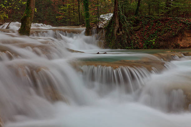 istock Waterfalls and mountain stream in autumn 178791064