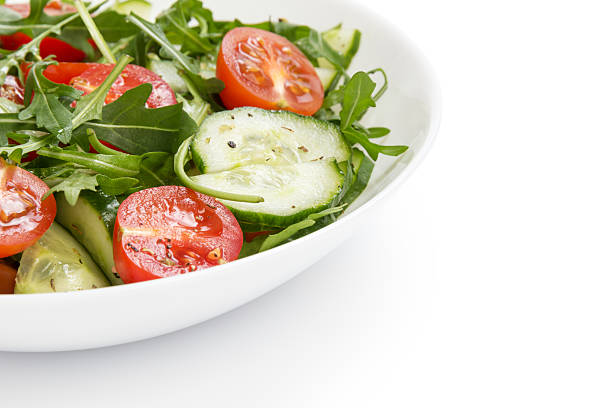 istock salad from ruccola, cherry tomatoes and cucumber 178791997