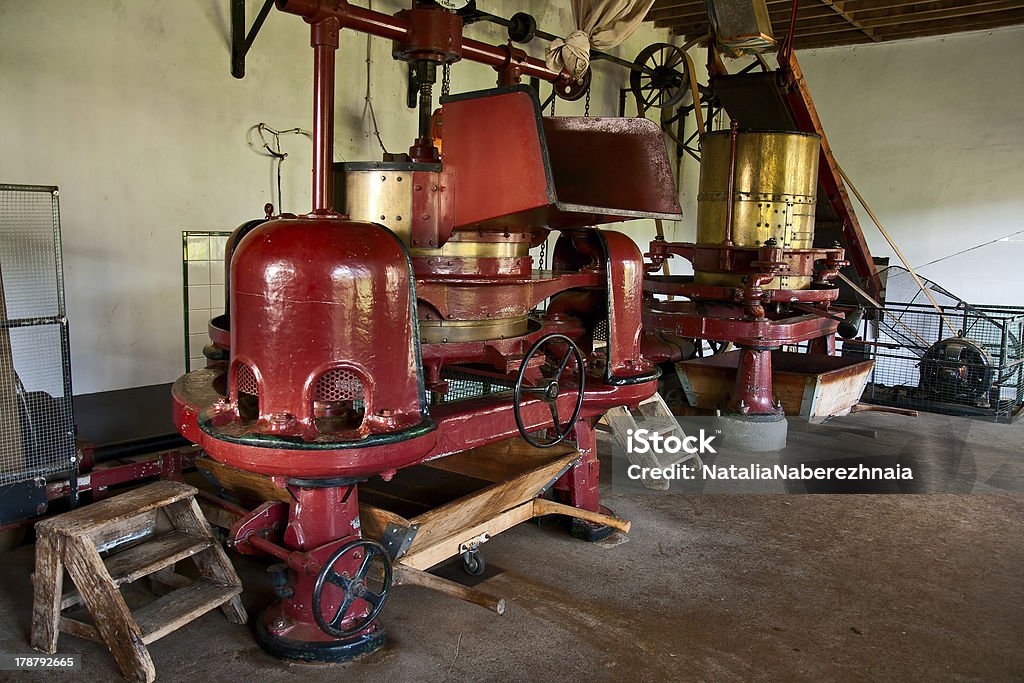 Old machine at small tea factory Old machines at tea factory on island Sao Miguel, Azores Agricultural Machinery Stock Photo